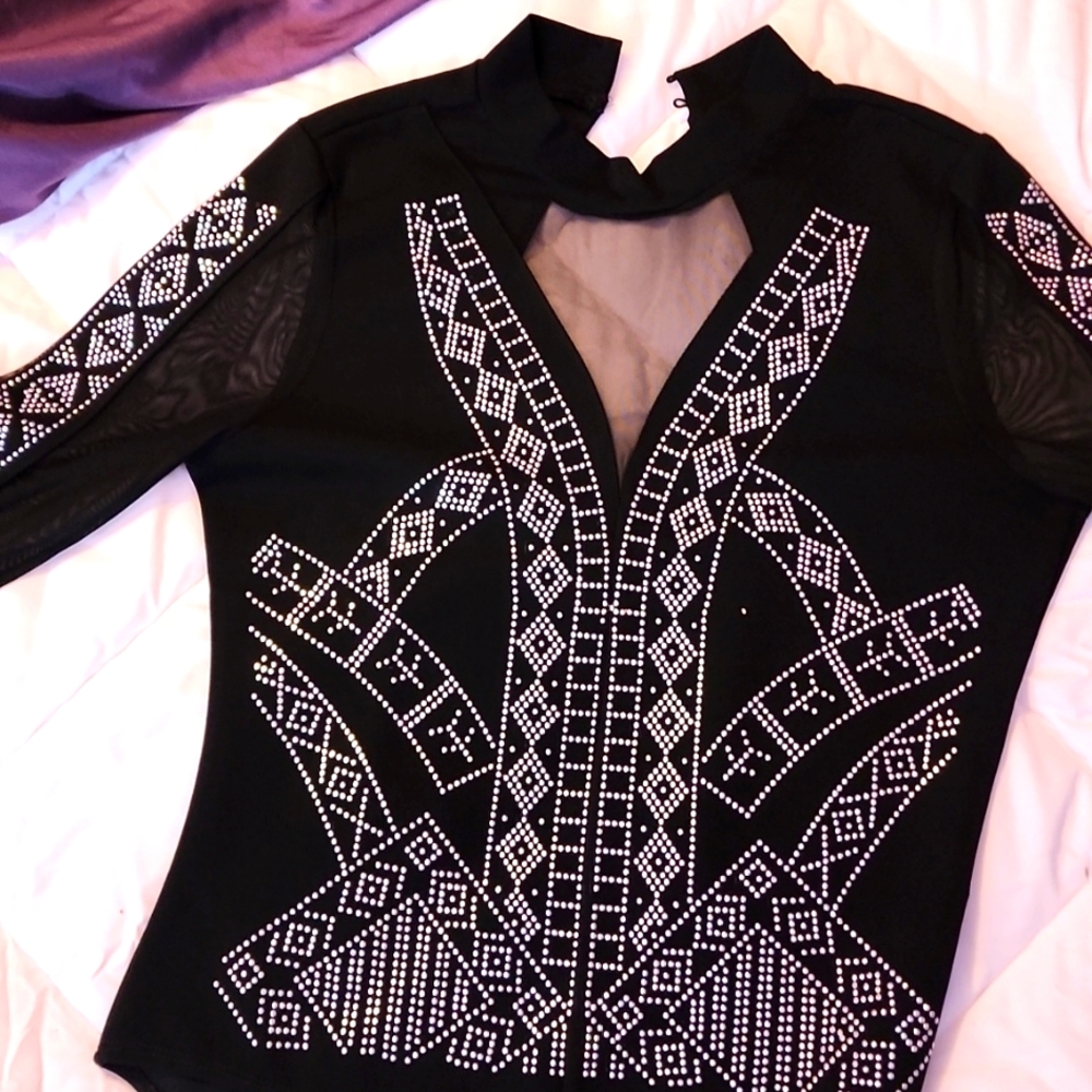 Black body suit with jewelry decor,
